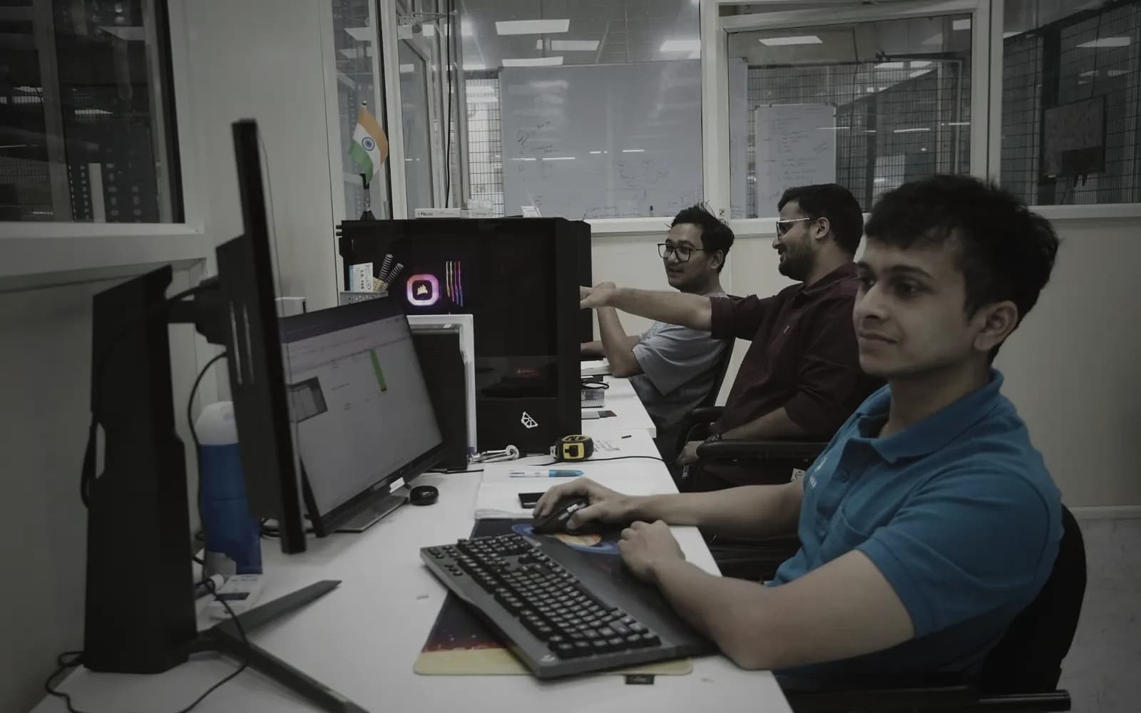 AlgoFET engineering and design team at their workstations
