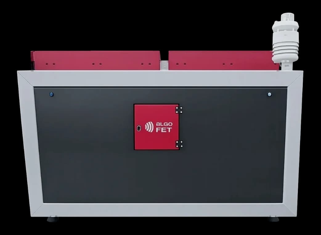 AlgoDOCK autonomous drone dock with twin red hatch lids and weather-sensor mast